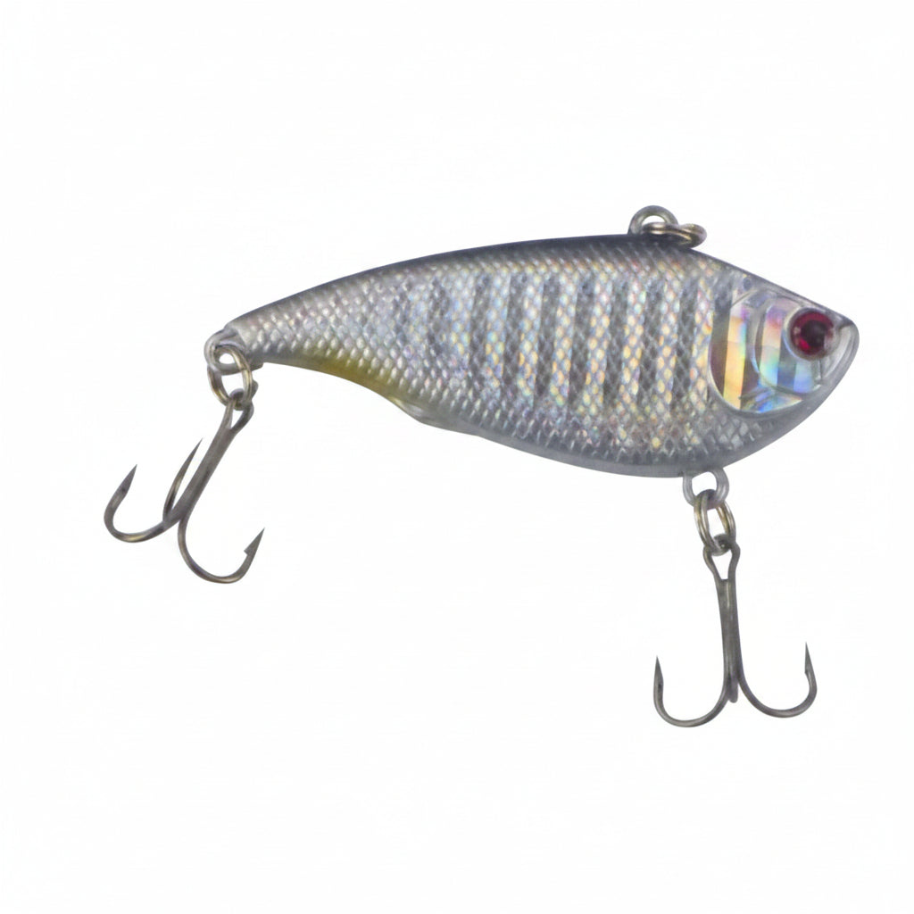 Lipless crankbait lure, side view, iridescent silver-gray finish with red eye and treble hooks