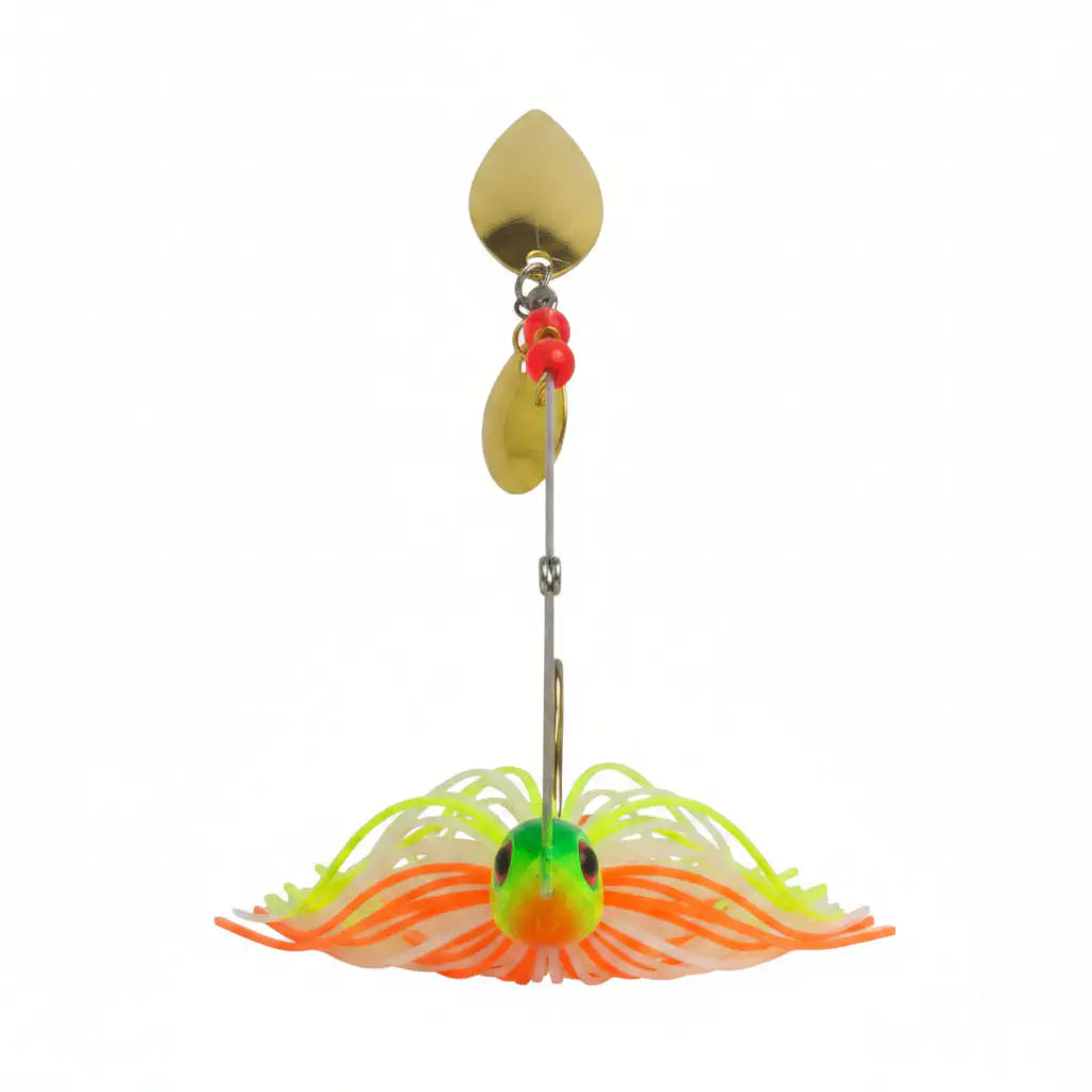Spinnerbait lure close-up with gold double blades, green head, orange skirt, red beads