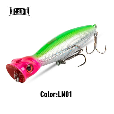 Floating popper fishing lure, green and pink body with treble hooks and split rings