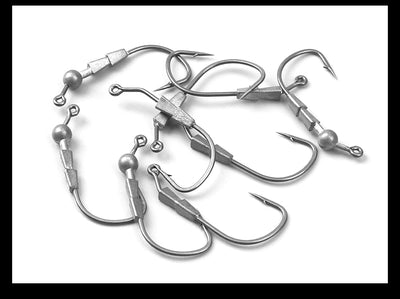 Assorted lead jig head hooks with weighted heads and curved barbed points, mixed set