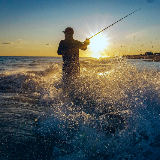 Angler fishing from a boat using braided fishing line and lures from Cast N Go Australia