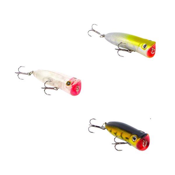 Set of three surface popper lures: white, yellow, and black with treble hooks