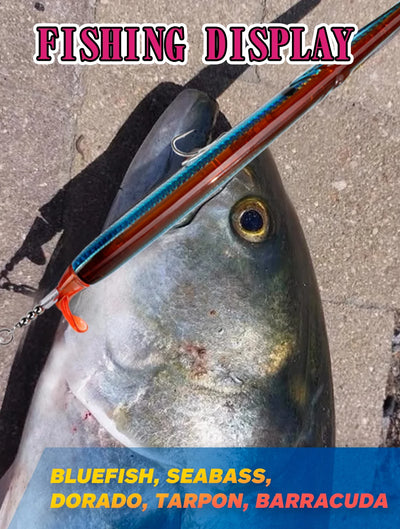 Blue and orange needle fishing lure near a fish on a dock surface