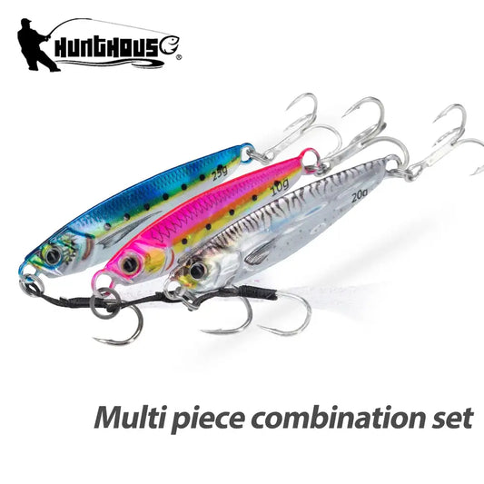 Metal jig fishing lures set with three sinking lures, colorful finishes and treble hooks.