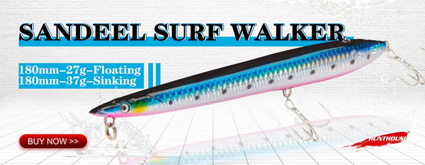 Long blue and pink sand eel surf walker lure with treble hooks