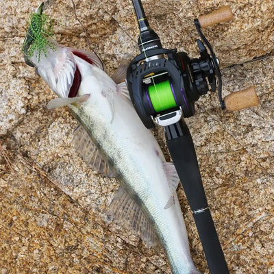 Bladed jig lure on a fishing scene beside a hooked fish and rod