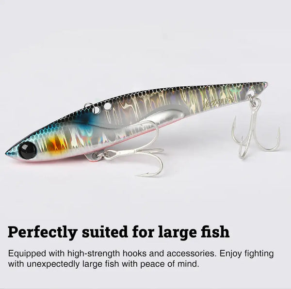 Silver holographic metal vibration lure with blue accents and treble hooks