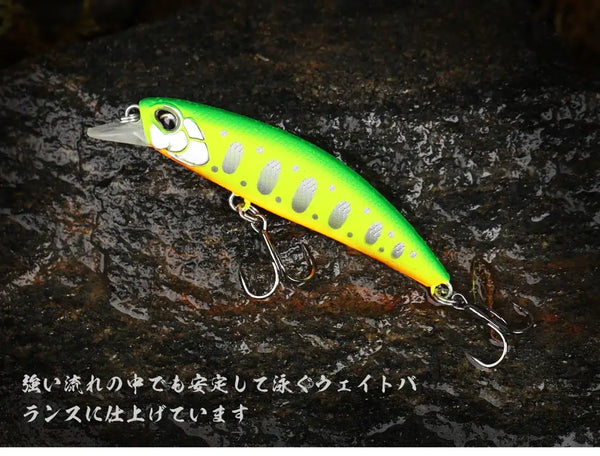 Bright green sinking minnow lure with yellow chartreuse accents and treble hooks