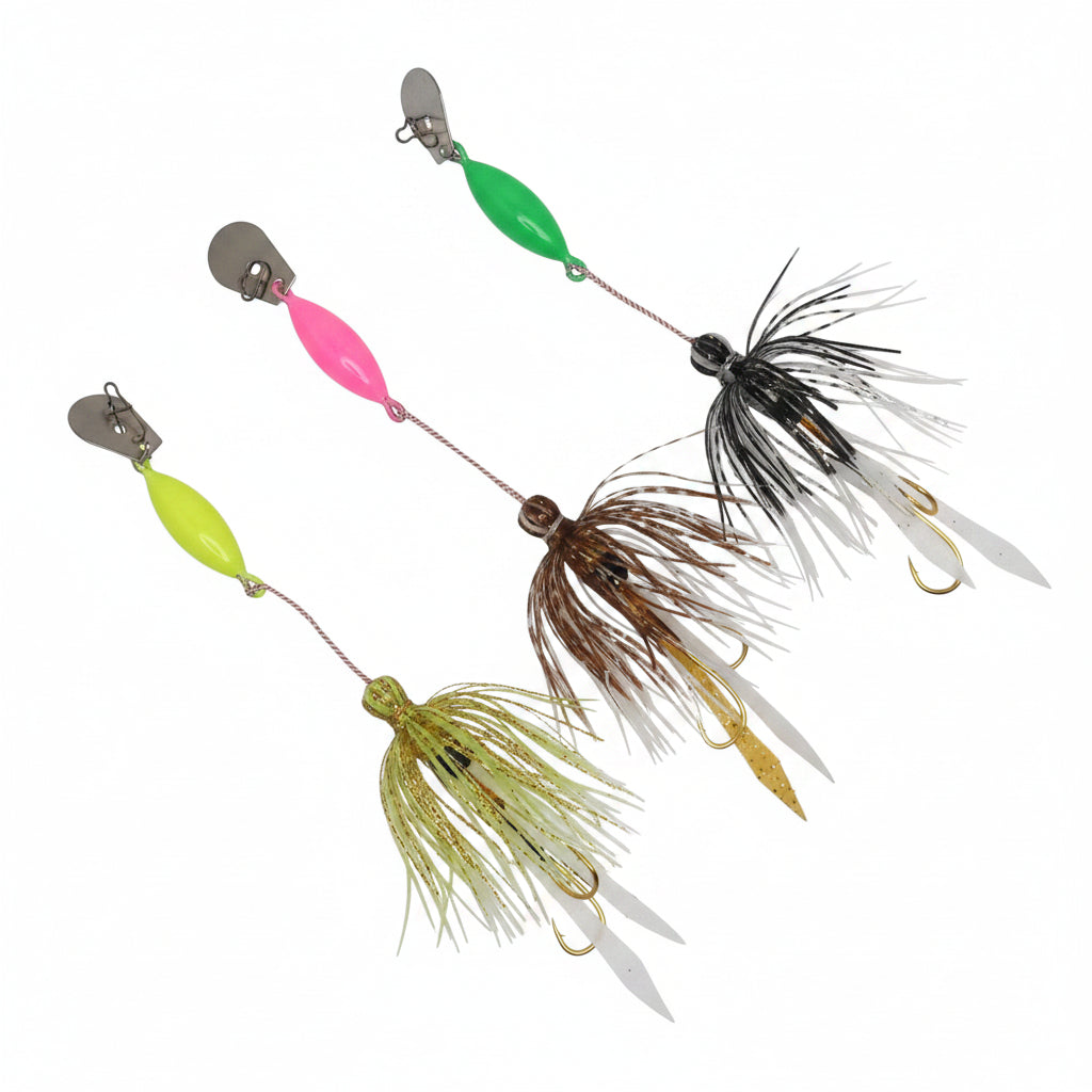 Set of three micro jigs with feather skirts and treble hooks, green, pink and gold