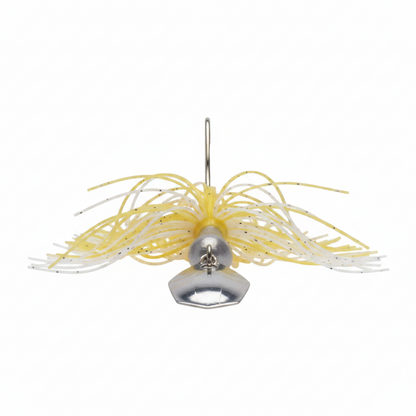 Yellow-and-gold skirt bladed swim jig with central metal blade and spinner
