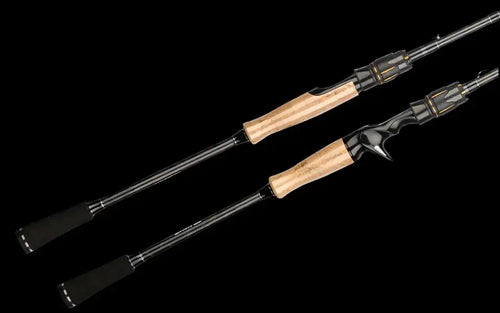 Two-piece fishing rods with cork grips and metal guides, side view