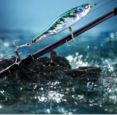 Surface fishing lure pencil with blue-silver scale pattern and two front trebles