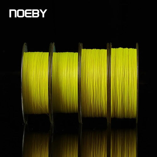 Light yellow braided fishing line wound on spool, multiple strands visible in close-up