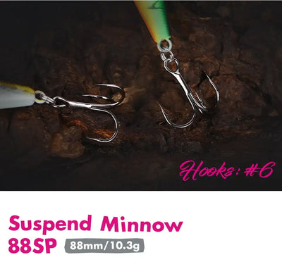 Two suspended minnow jerkbaits with treble hooks and metal split rings