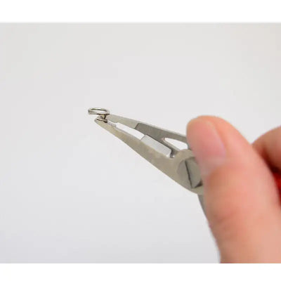 Stainless steel fishing line cutter pliers jaw end held by fingers
