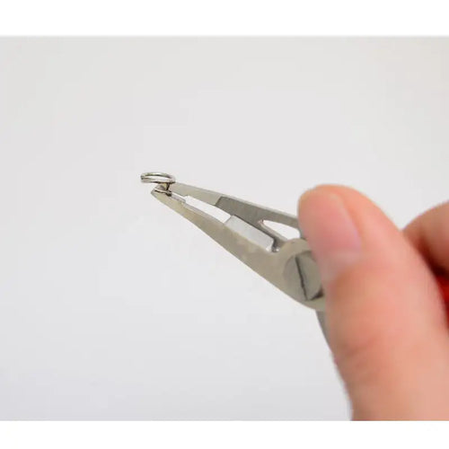 Stainless steel fishing line cutter pliers jaw end held by fingers