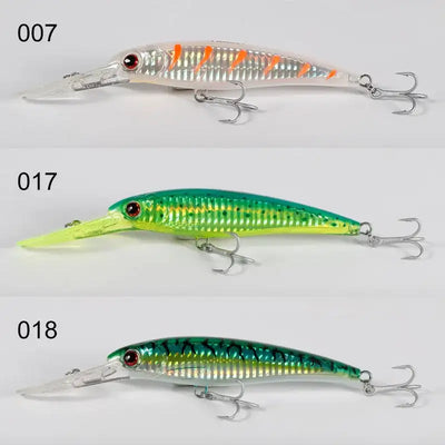 Saltwater trolling minnow wobbler set of three: orange-white, green-yellow, and dark green