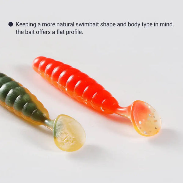 Ribbed silicone swimbait lure close-up, red-orange body and dark green body with paddle tails