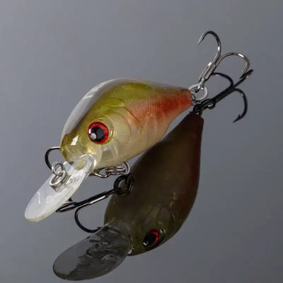 Floating crankbait lure with green-orange gradient body, red eye, clear lip, treble hooks