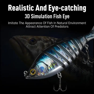 Multi-jointed hard fishing lure close-up, silver-blue scales, treble hooks