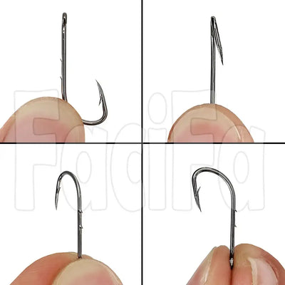 Barbed offset bait fishing hooks held by fingers, long-shank narrow point