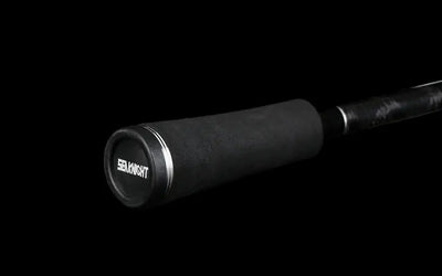 Fishing rod butt cap with SEAKNIGHT logo on dark carbon handle