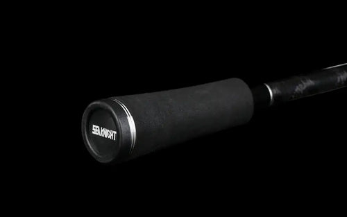 Fishing rod butt cap with SEAKNIGHT logo on dark carbon handle
