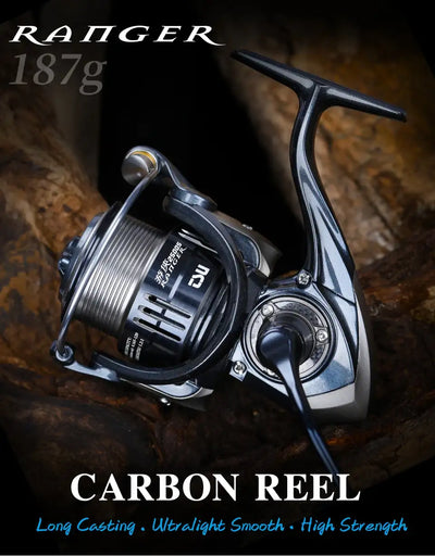 Carbon reel spinning reel with black spool, silver body, and long handle