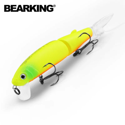Jointed swimbait lure, bright yellow hard body with two treble hooks