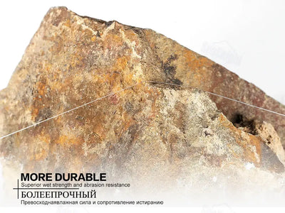 Fluorocarbon-coated monofilament fishing line stretched across a rocky surface