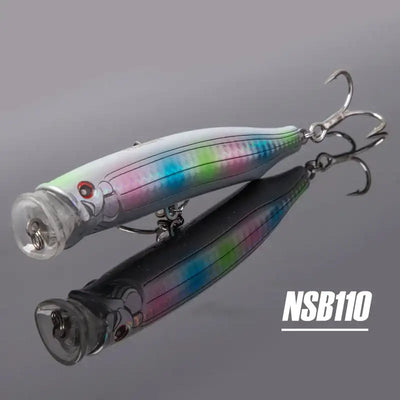 Noeby feed popper topwater lure, silver body with green-blue rainbow finish and treble hooks