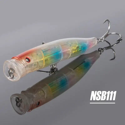 Two topwater feed popper lures, clear translucent body with rainbow shine, treble hooks, NSB111