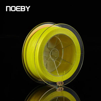 Light yellow braided fishing line spool showing transparent inner core and braided strands