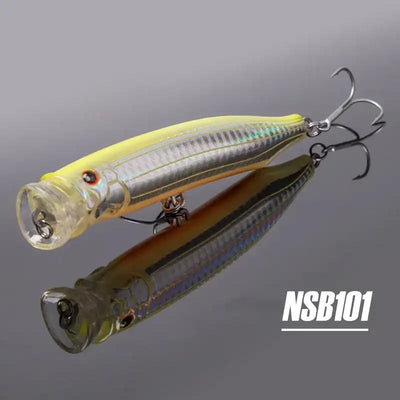 Noeby feed popper topwater lure, yellow-gold body with blue lining and treble hooks