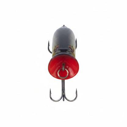 Surface fishing lure front view with red cup nose, black body, and treble hooks