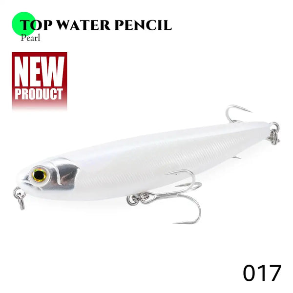 Floating pencil fishing lure in pearl white with gold eye and treble hooks
