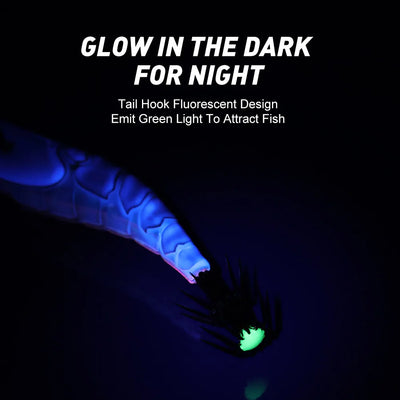 Glow-in-the-dark squid jig lure with blue body and green fluorescent tail hook