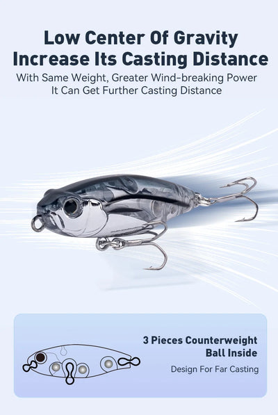 Metallic black and silver topwater pencil fishing lure with two treble hooks
