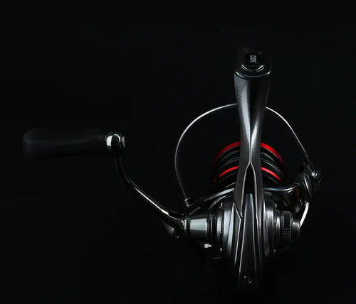 Spinning reel front view with black frame and red-ring spool