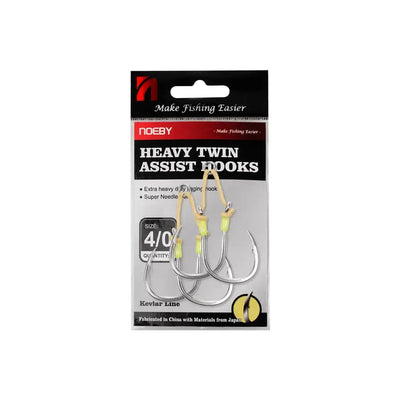 Heavy twin assist fishing hooks with yellow jig beads, size 4/0, on package