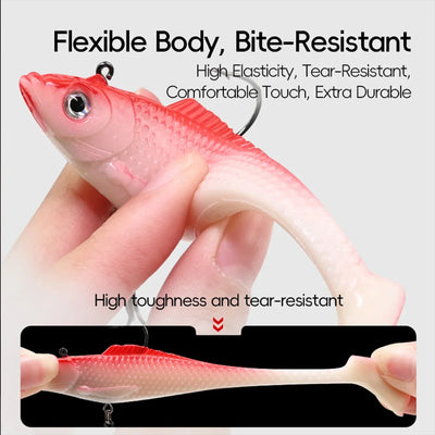 Pink-red swimbait lure with flexible body, treble hook, and red eye