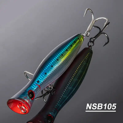 Blue-green and chartreuse topwater popper hard bait with treble hooks
