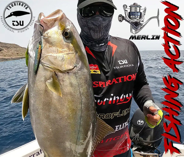 Ultralight spinning reel in use on fishing rod with captured fish and sea backdrop