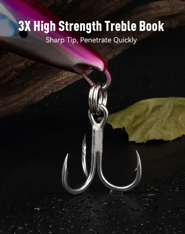 Topwater popper lure with three treble hooks attached to front eye ring