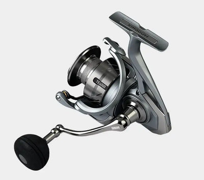 Spinning fishing reel with silver spool and black handle grip, angled studio view