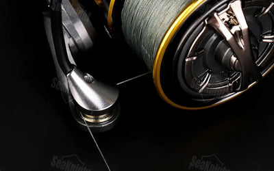 SeaKnight ARCHER2 black and gold spinning reel with metallic CNC aluminum spool and fish alarm features