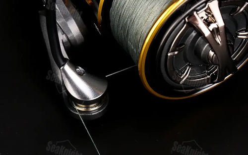 SeaKnight ARCHER2 black and gold spinning reel with metallic CNC aluminum spool and fish alarm features