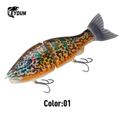 Brown and speckled trout-pattern jointed swimbait lure with blue-green highlights