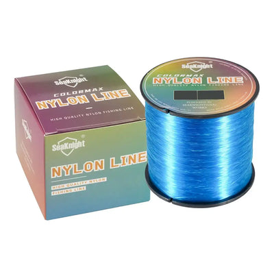 Blue nylon fishing line spool with product box.