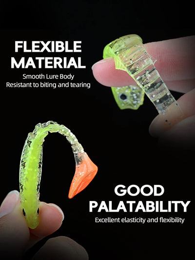 Green translucent paddle tail swimbait with orange nose and visible segmented texture.